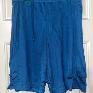 Blue Nike shorts with black seam check boys small